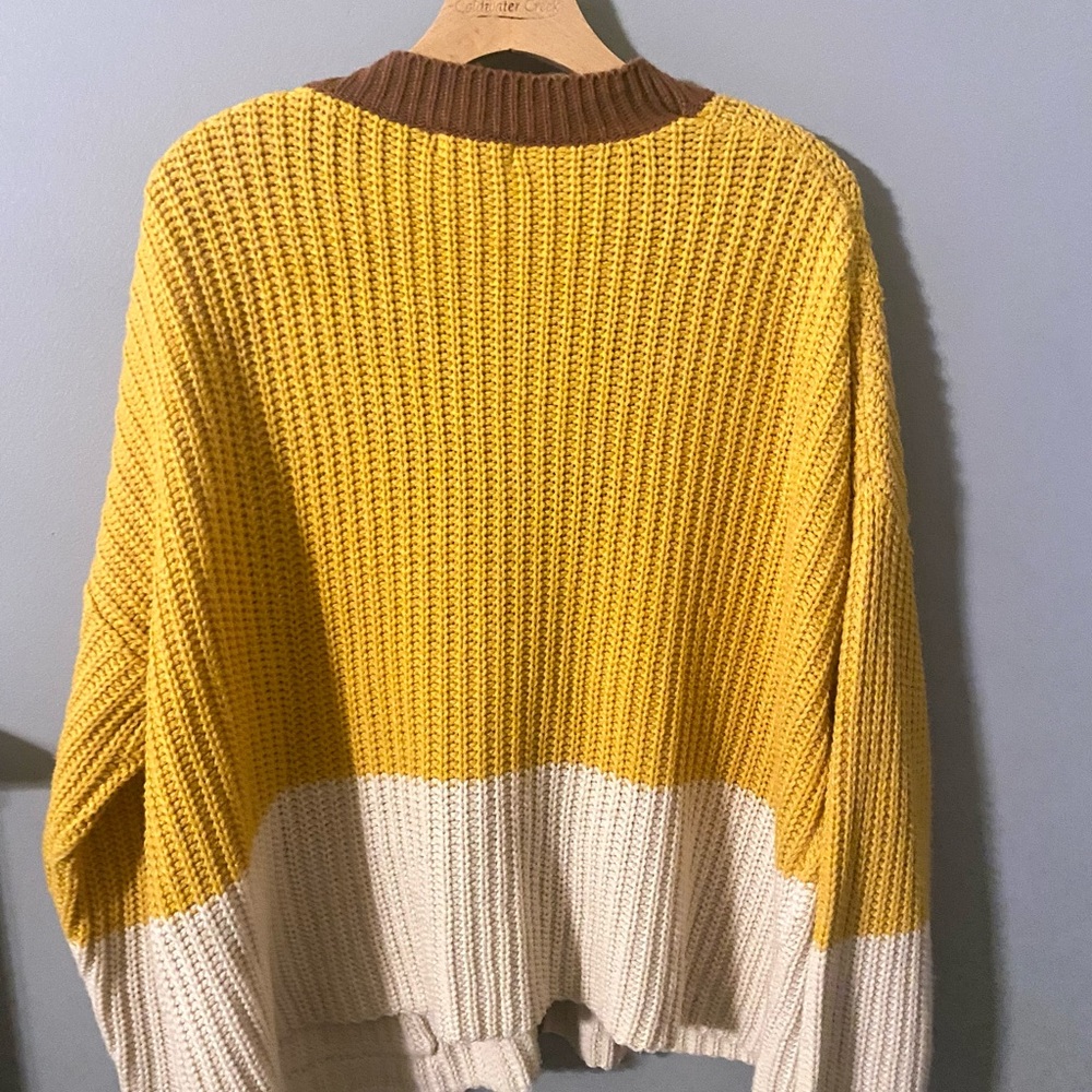 Yellow cream cardigan with brown outlining. Brand: Olive scent. Size: s